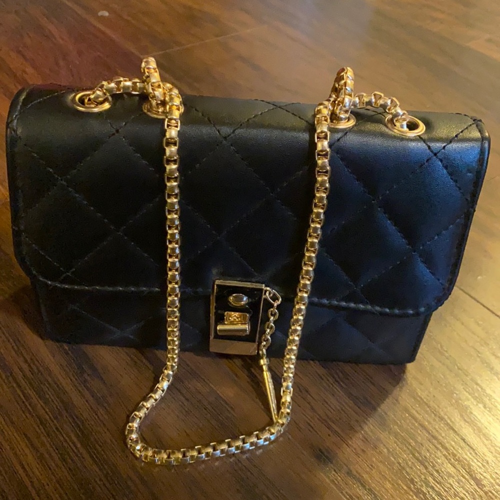 Black quilted purse with chain strap